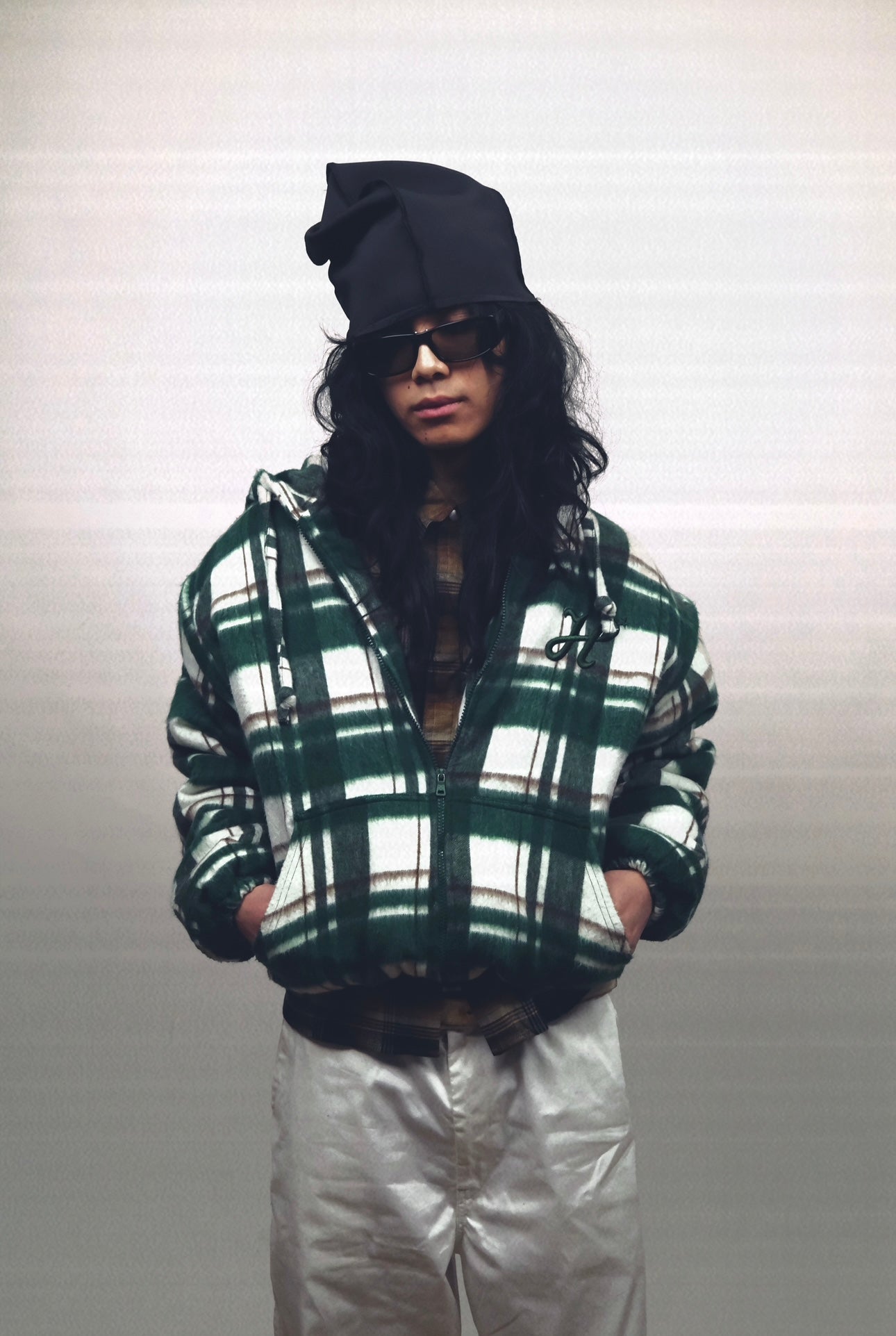 veste zipé a capuche avec doublure matelassé.